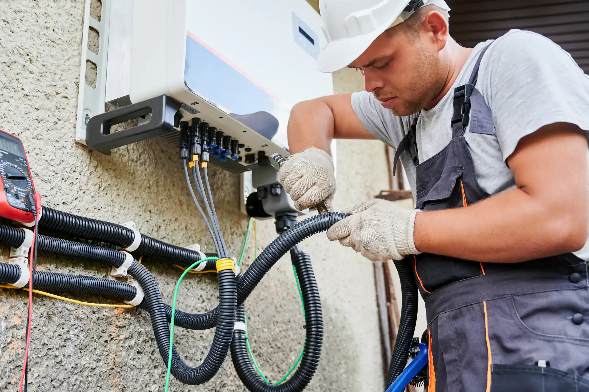 Generator installation technician connecting a new standby generator at a residential property in Dallas County, Texas.