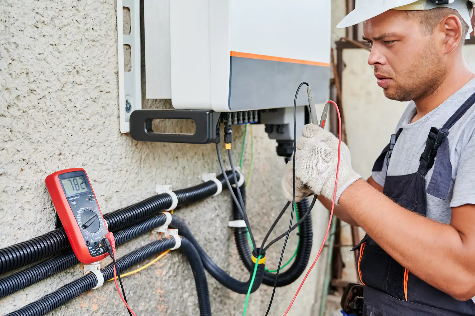 Technician inspecting and testing generator wiring in Dallas County, Texas, ensuring safe and efficient electrical connections